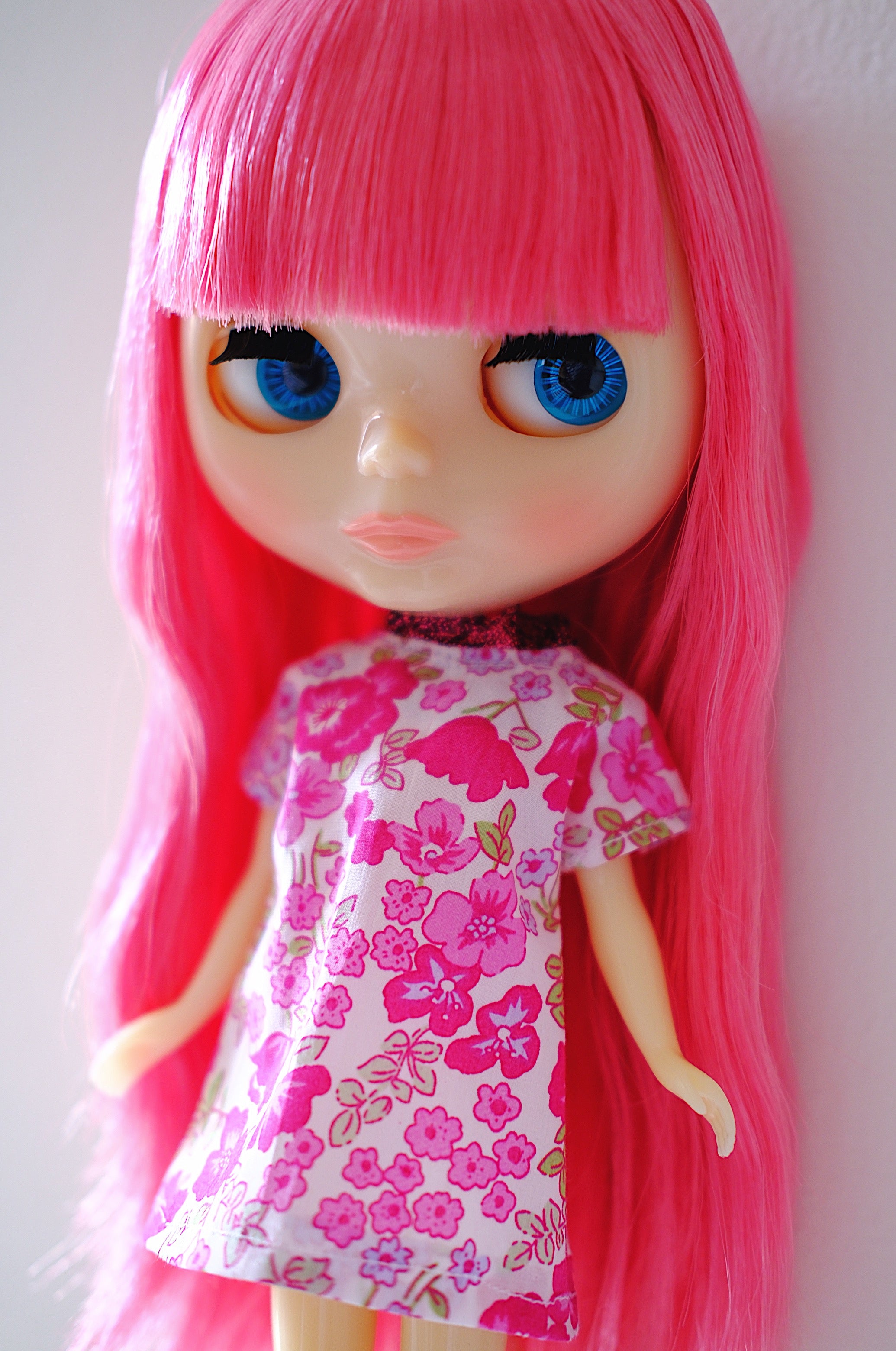pink blythe doll wearing floral pink unique hand made dress